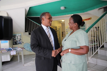 Permanent Secretary in the Ministry of Education and Principal Education Officer Mrs. Lornette Queeley-Connor welcomes Minister of Education and Premier of Nevis Hon. Vance Amory to the Ministry of Education at Marion Heights